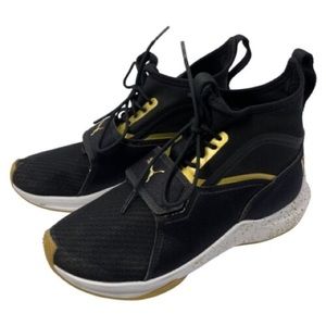 Puma women’s gold Phenom training sneaker size 9.5